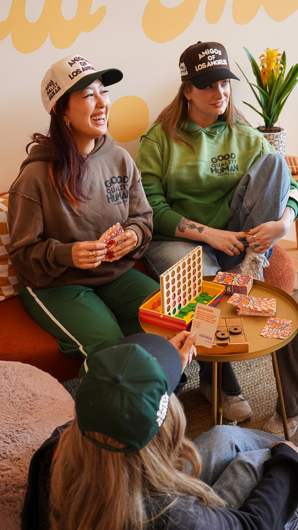 A group of girls laughing and playing games